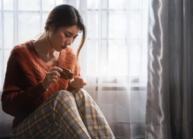 depressed-girl-taking-lot-pill